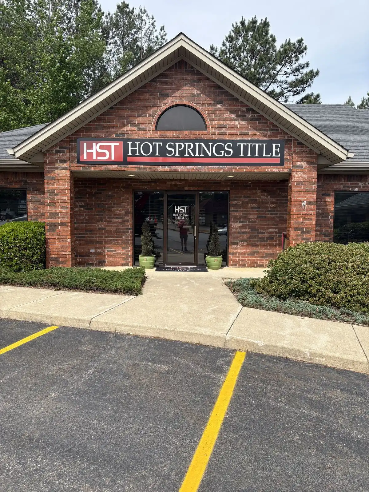Printed wall sign for Hot Springs Title provided and installed by Seiz Sign Company