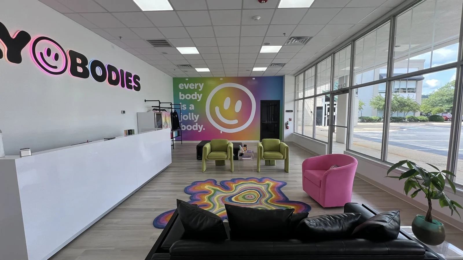 Interior wall mural and dimensional letters installed for Jolly Bodies by Seiz Sign Company