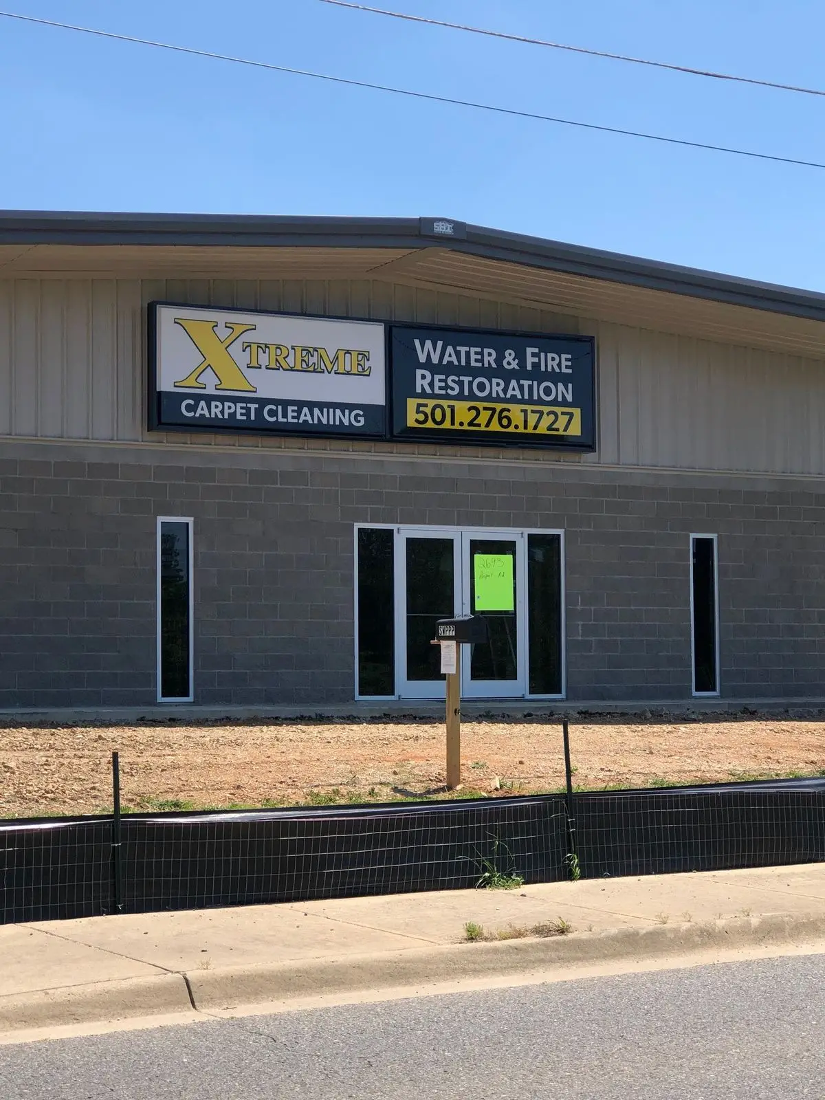 Xtreme Carpet Cleaning wall sign with embossed and painted sign faces, provided and installed by Seiz Sign Company